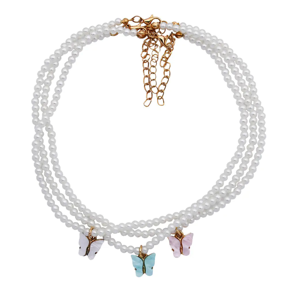 Opal bow knot necklace close up - European pearl accents iridescent shimmer light luxury women jewelry